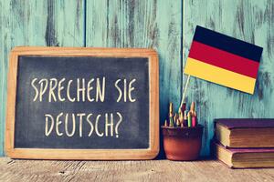 Bild vergrößern: Bild mit Slogan "Sprechen Sie Deutsch"